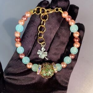 DIVINE FORTUNE — Handcrafted Aquamarine Glass Beaded Bracelet with Clover Charm